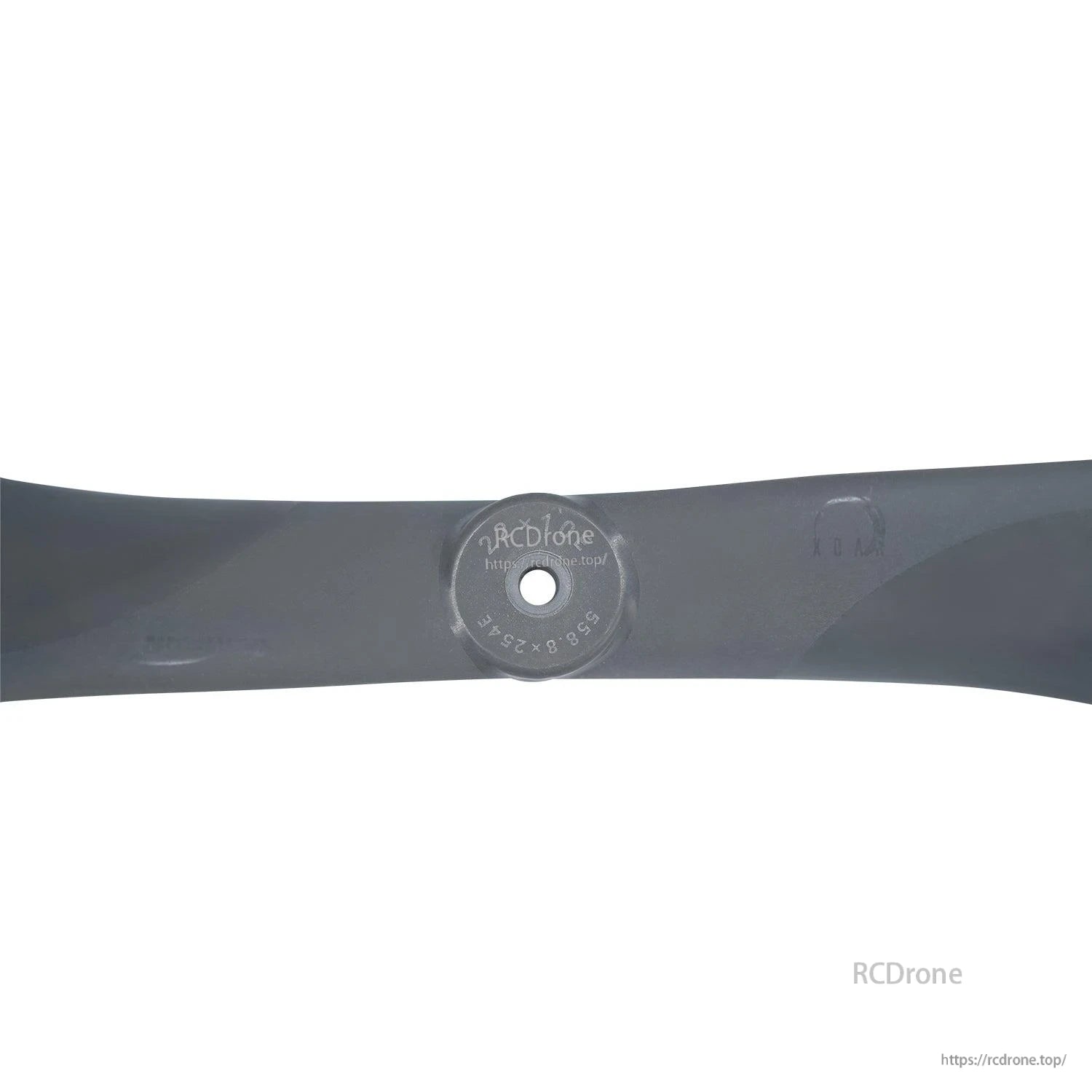 Hub close-up showing center bore and molded size markings on the propeller