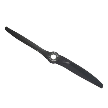 Single Gemfan Vortex 5.25x8 propeller, angled top view showing hub markings and center bore