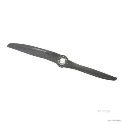 Two-blade propeller, angled view from opposite direction showing hub text and blade curvature