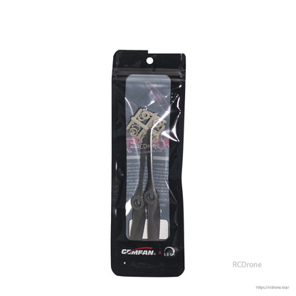 Sealed Gemfan propeller bag with hardware visible through window, hanging tab top