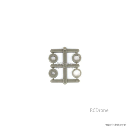 Included mounting spacer rings/adapters shown on sprue, close-up