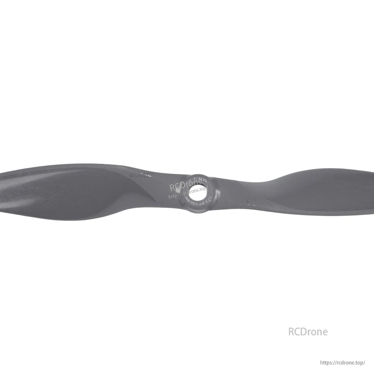 Close-up of propeller hub and mounting hole with molded markings on blade root