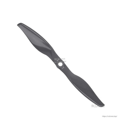 Angled top view of two-blade propeller highlighting airfoil curve and center mounting hole