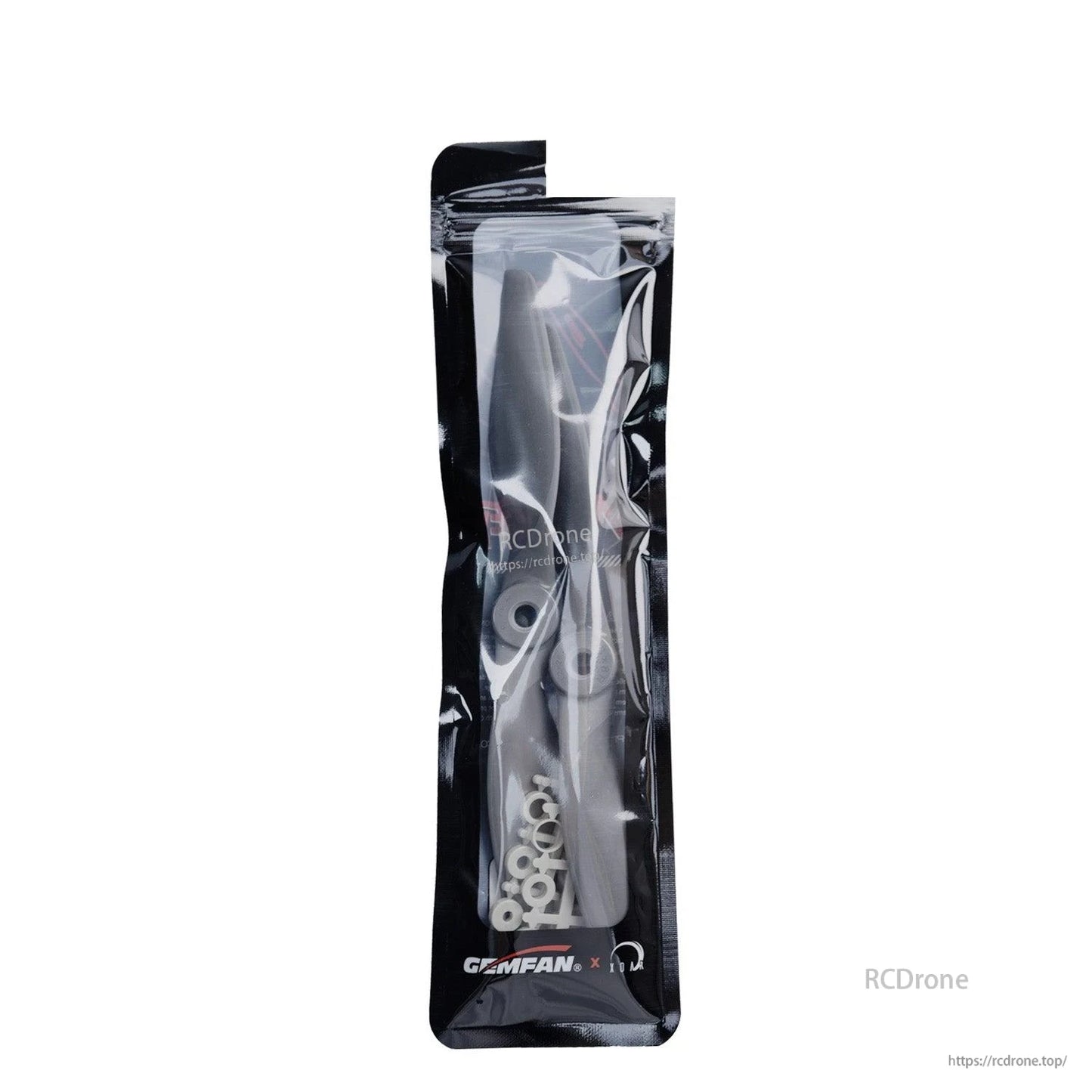 Retail bag packaging showing two propellers and adapter rings inside sealed Gemfan pouch