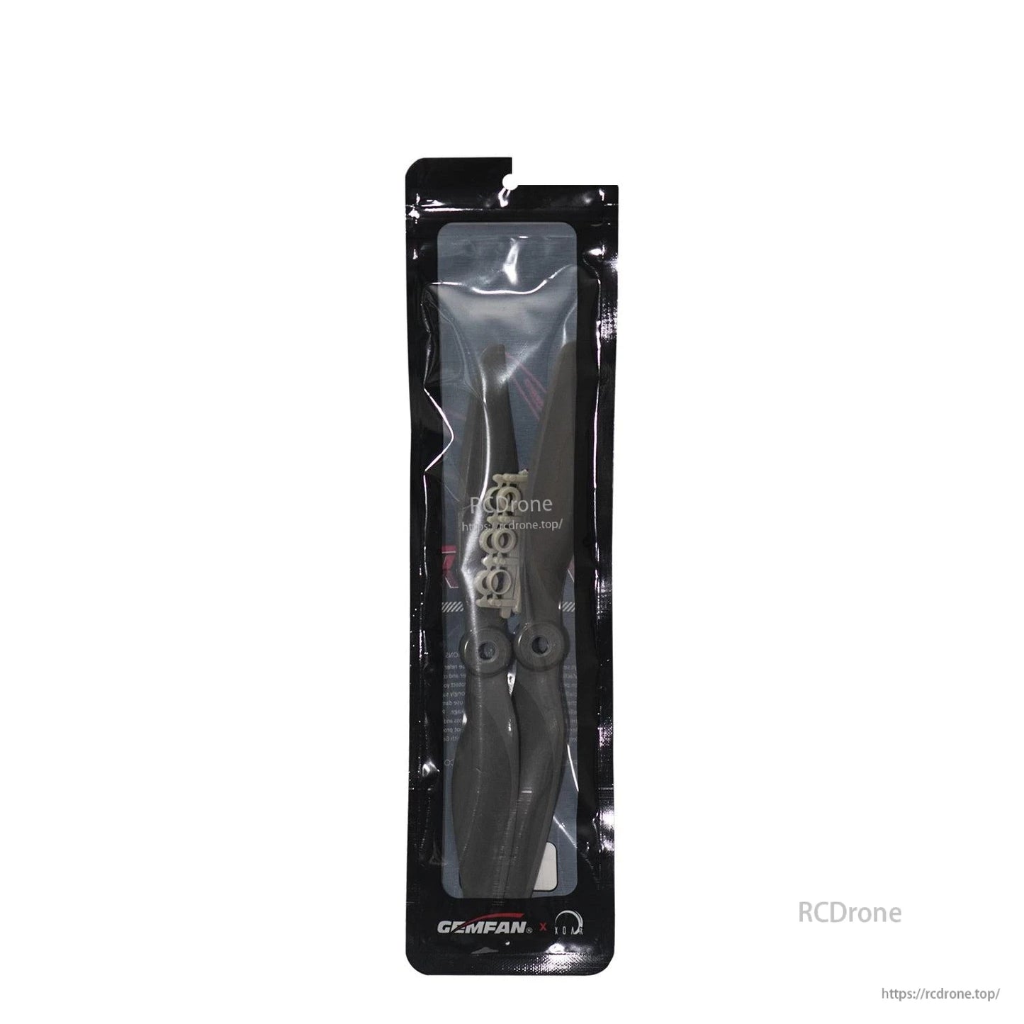 Sealed Gemfan retail bag with two propellers and adapter rings visible through clear window
