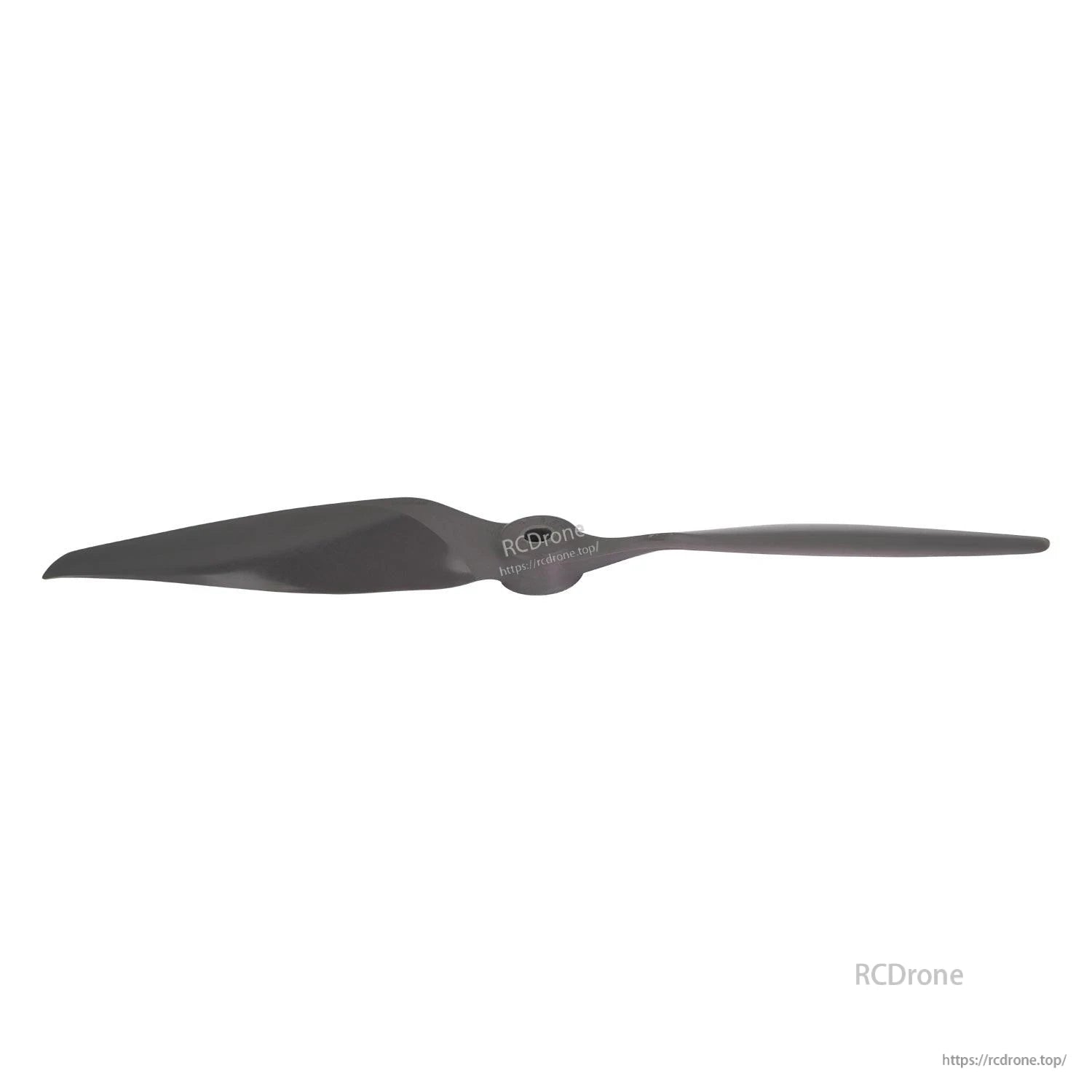 Low-angle side view of propeller showing thin trailing edge and hub profile