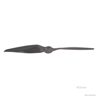 Low-angle side view of propeller showing thin trailing edge and hub profile