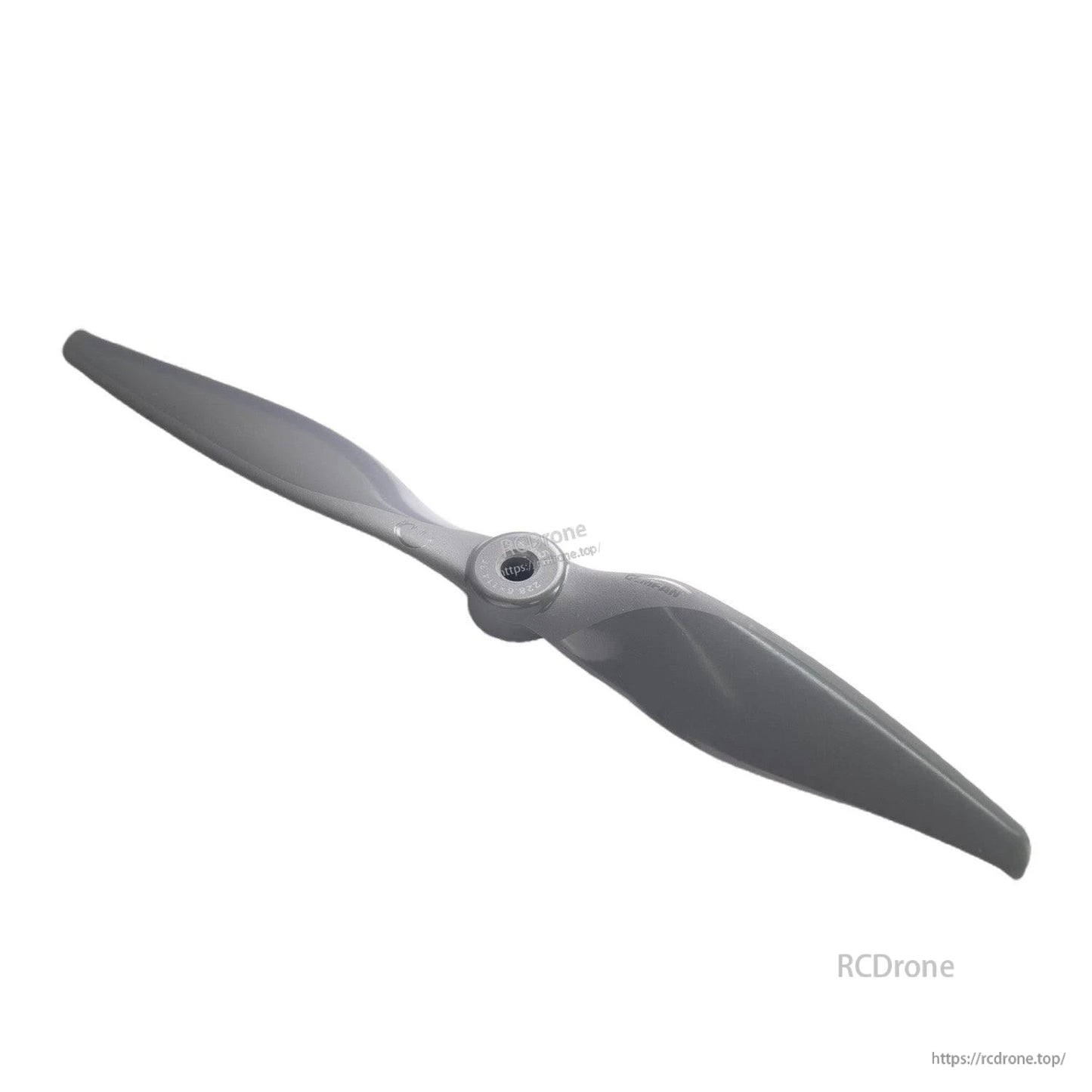 Angled view of two-blade propeller highlighting curved blade shape and hub