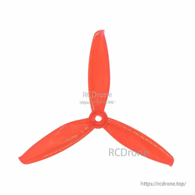 Translucent red/orange 3-blade propeller, top view showing blade shape and hub opening