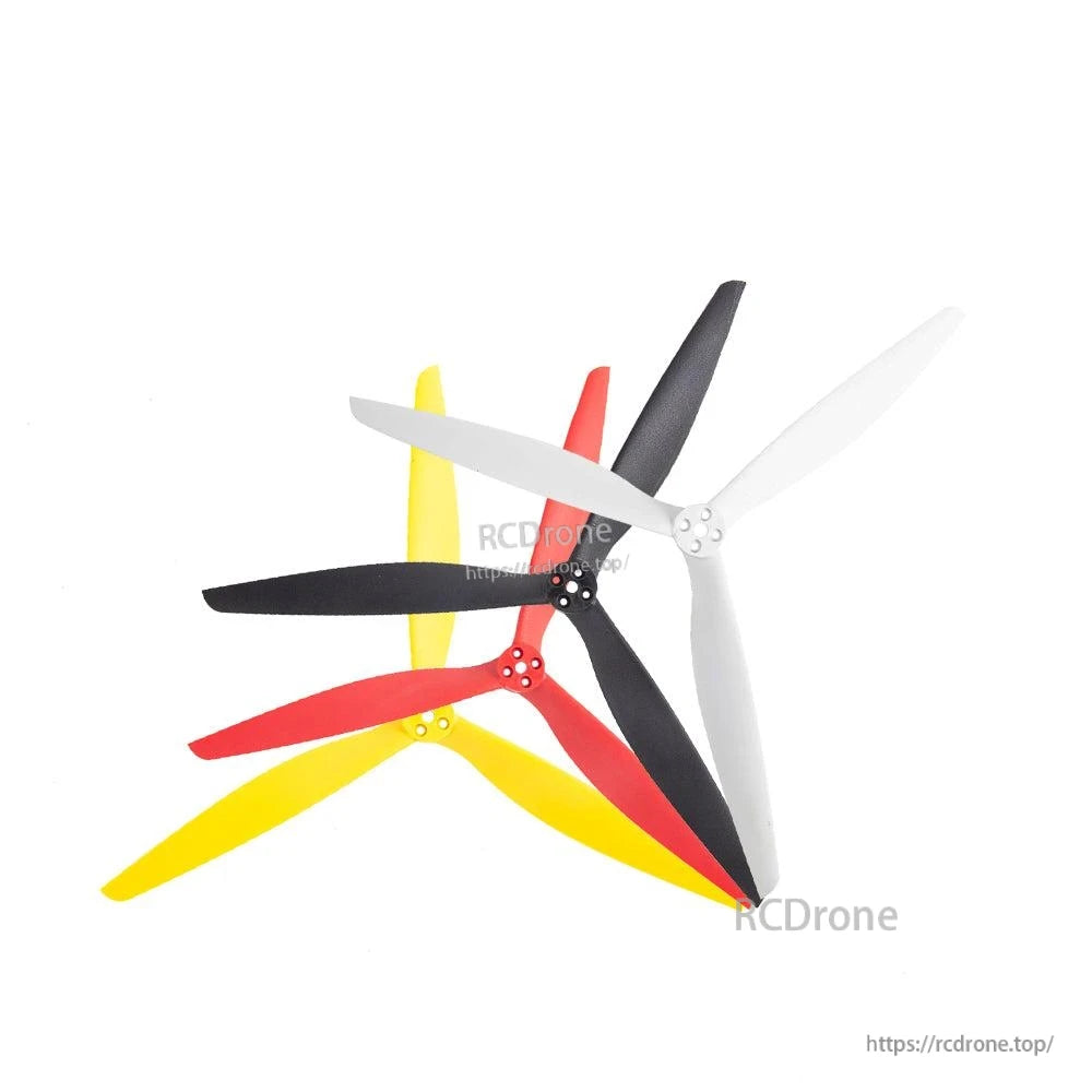 Assorted color 3-blade propellers shown together: black, white, red, and yellow tri-blades