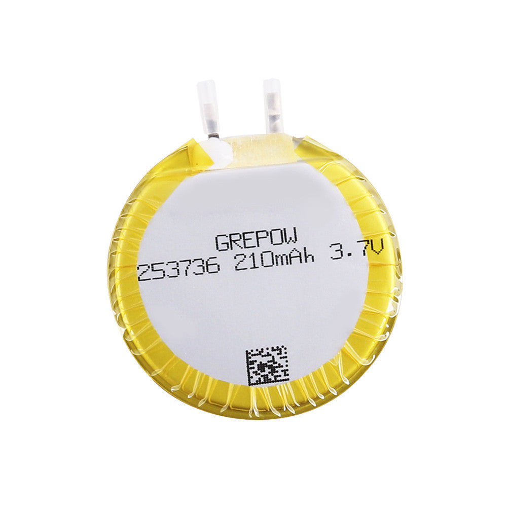 Grepow round LiPo battery cell with solder tabs, labeled 210mAh 3.7V, wrapped in yellow insulation