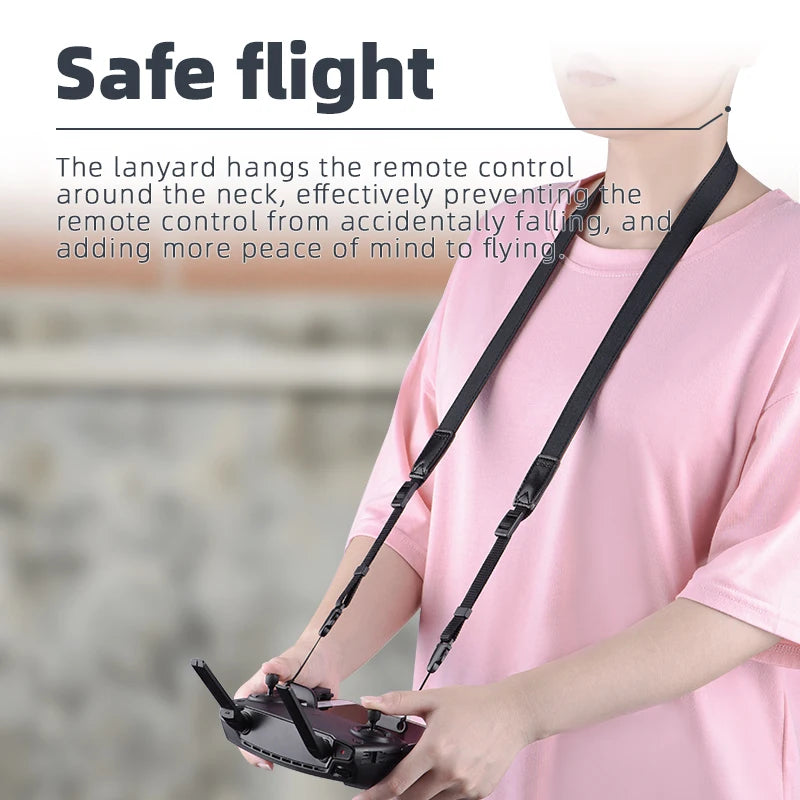lanyard hangs remote control around neck to keep it safe . hend:
