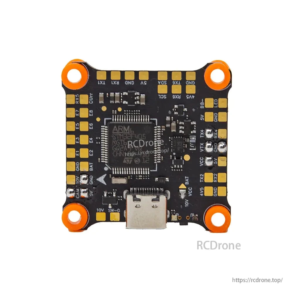 STM32F405 FC close-up with solder pads and port labeling on 30.5x30.5mm FPV stack board