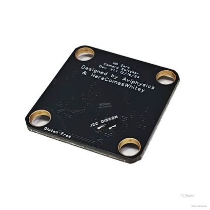 Back of HDZero camera switch PCB with “Designed by Aviphysics & Herecomeswitey” text and mounting holes