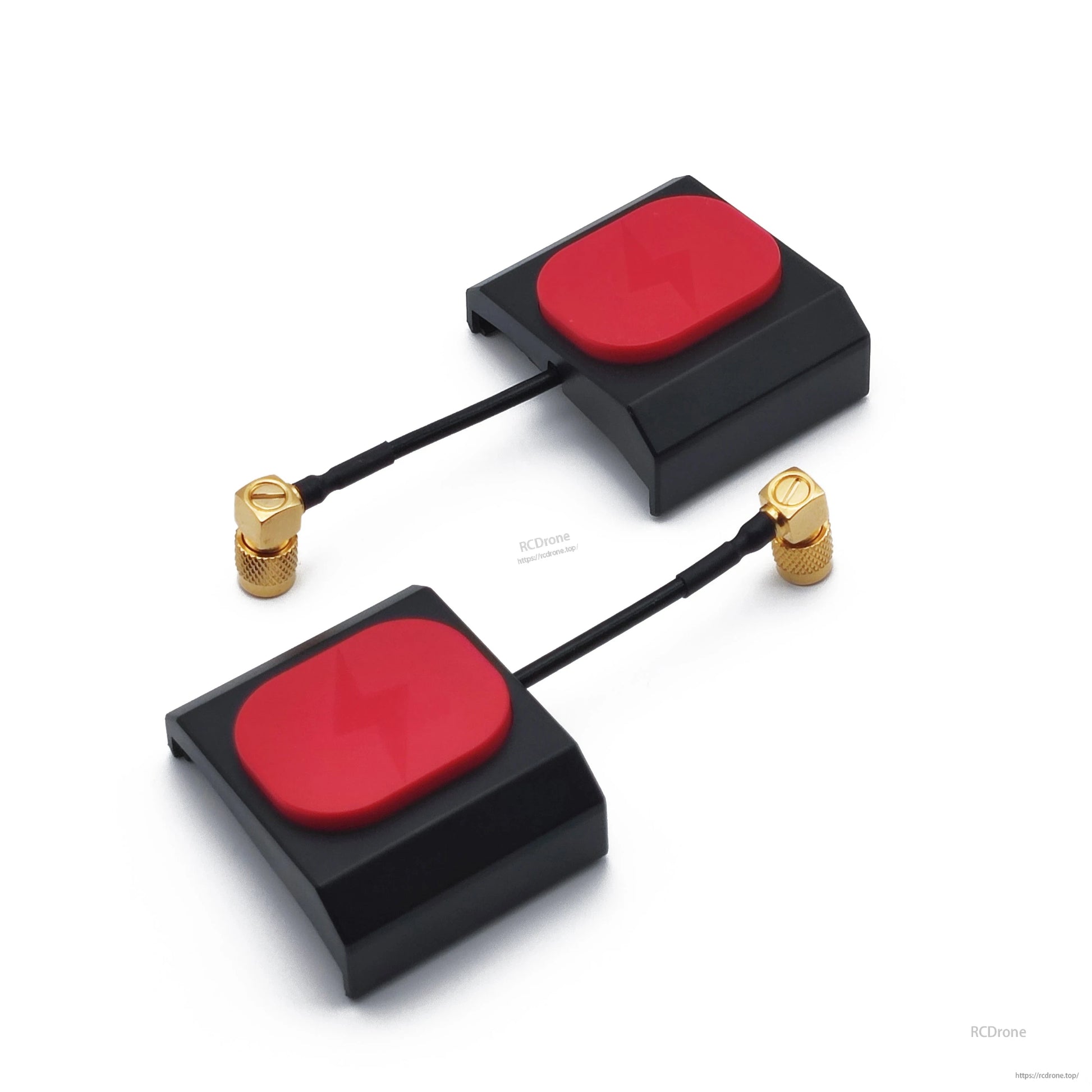 Two black Echo patch antennas with red faceplates, each with short coax lead and right-angle connector