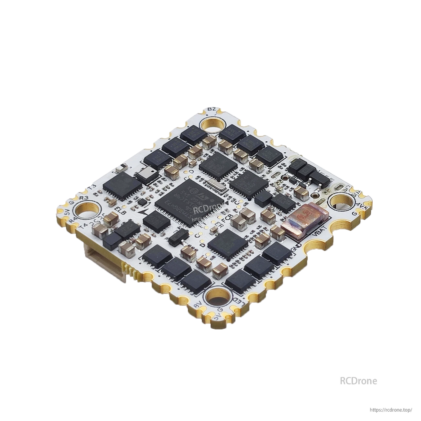Angled view of flight controller PCB underside showing chipset area, components, and mounting holes