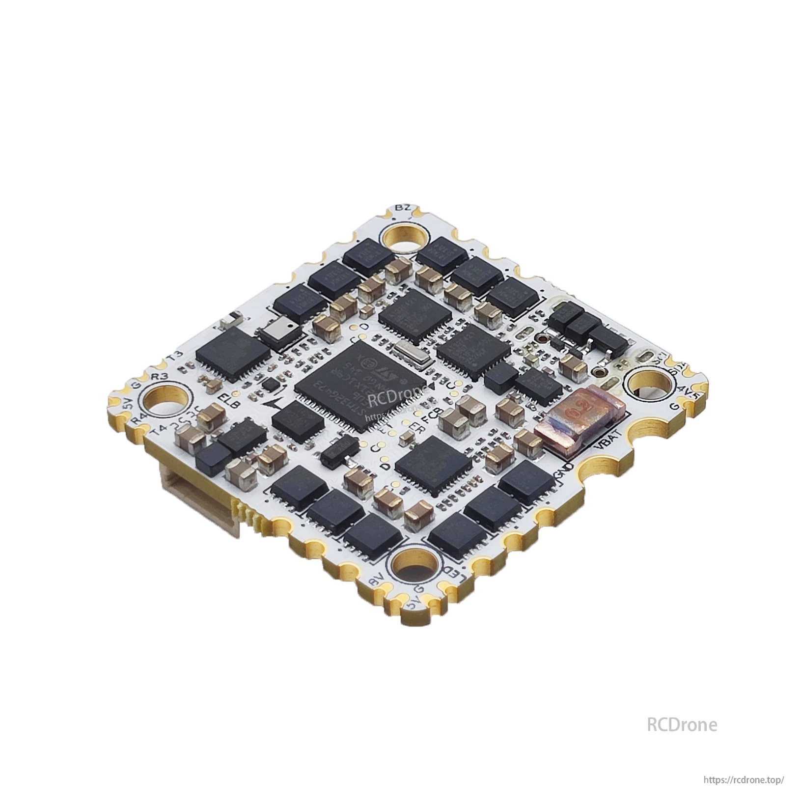 Angled view of flight controller PCB underside showing chipset area, components, and mounting holes