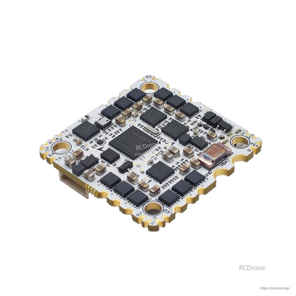Angled view of flight controller PCB underside showing chipset area, components, and mounting holes