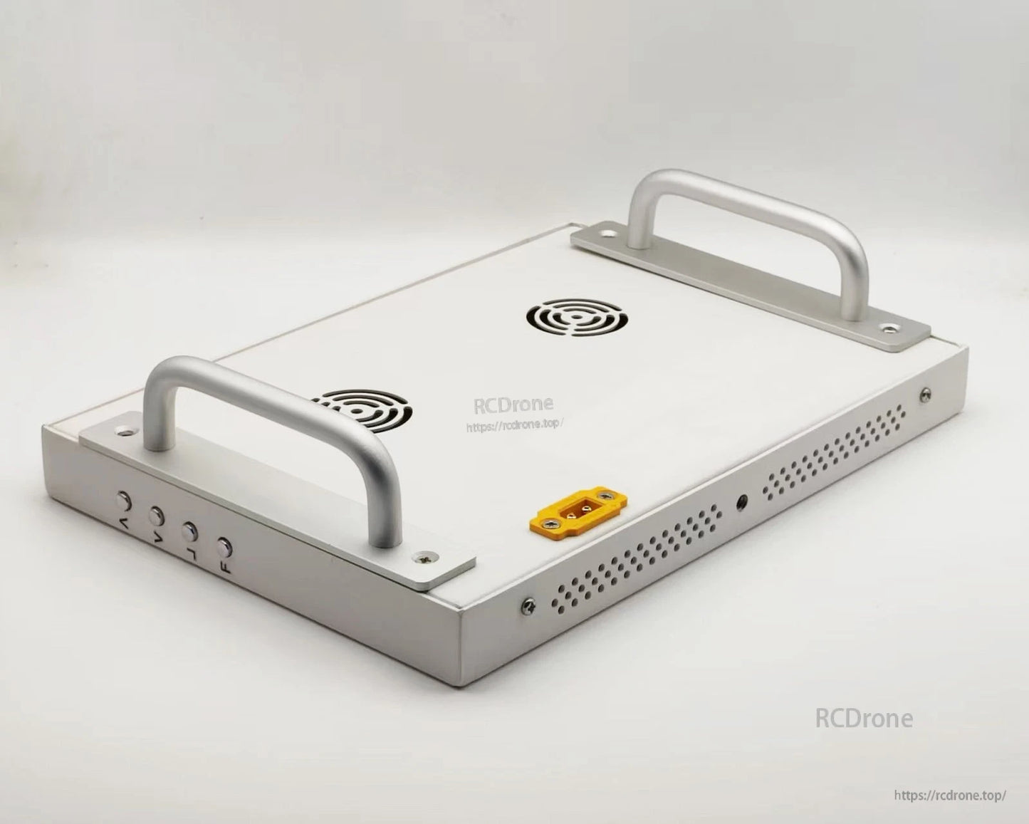 Monitor rear view with two carry handles, cooling vents, and side button/port cutouts