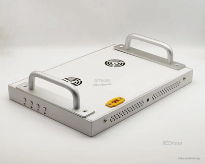 Monitor rear view with two carry handles, cooling vents, and side button/port cutouts