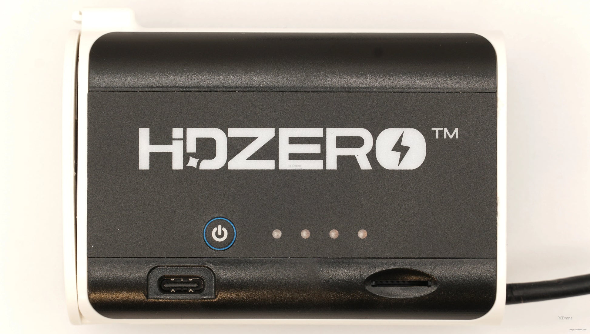 Front close-up of HDZero battery case showing logo, power button, LED indicator row, and USB-C port