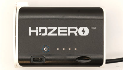 Front close-up of HDZero battery case showing logo, power button, LED indicator row, and USB-C port