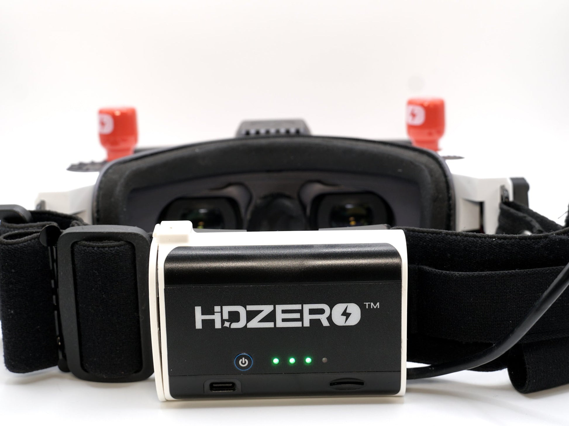 HDZero Rear-Mount Battery Case installed on HDZero FPV goggles, front view with LED battery indicators
