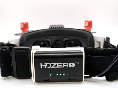 HDZero Rear-Mount Battery Case installed on HDZero FPV goggles, front view with LED battery indicators