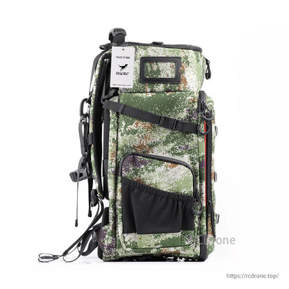 Right side view showing side mesh pocket, compression strap and top ID window area