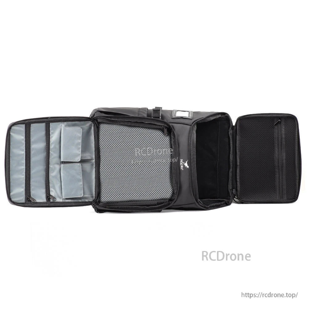 Backpack interior layout shown open flat with padded dividers, mesh pocket and zip compartments