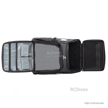 Backpack interior layout shown open flat with padded dividers, mesh pocket and zip compartments