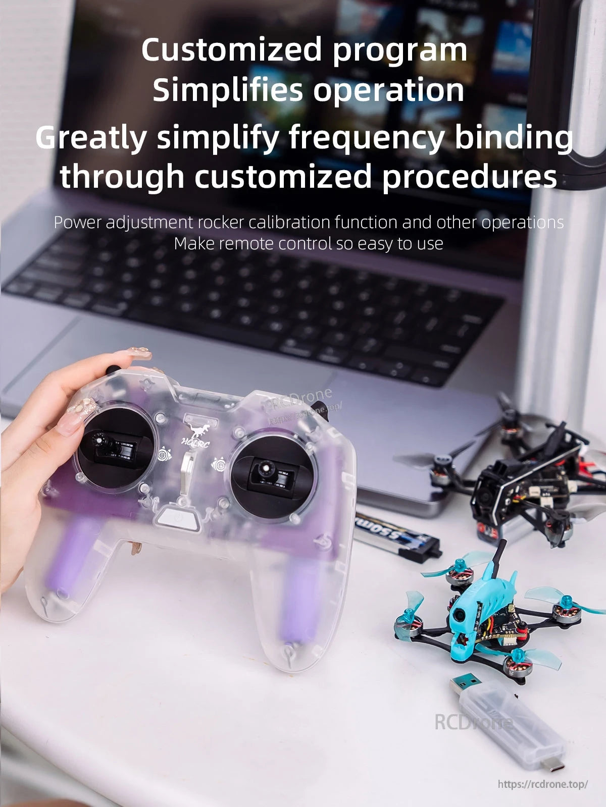 Desktop setup with controller and FPV quad, highlighting simplified frequency binding and calibration workflow