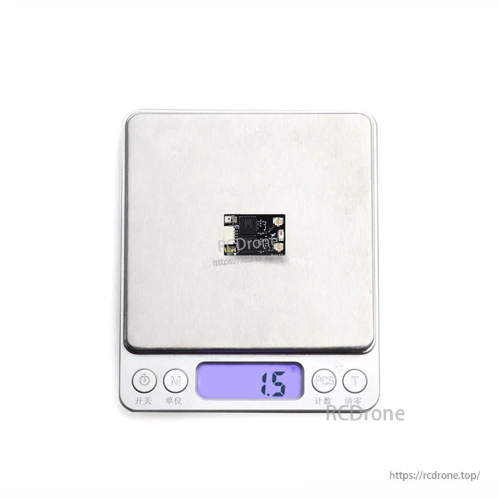 Receiver board on digital scale showing 1.5 g weight