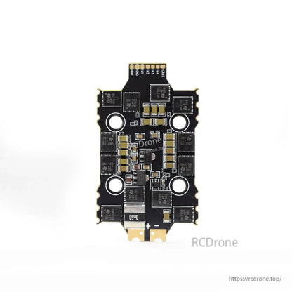 HGLRC 4-in-1 ESC underside showing MOSFET layout and central power components