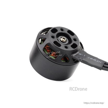 Bottom mounting base view with screw holes and center shaft, wire exit detail