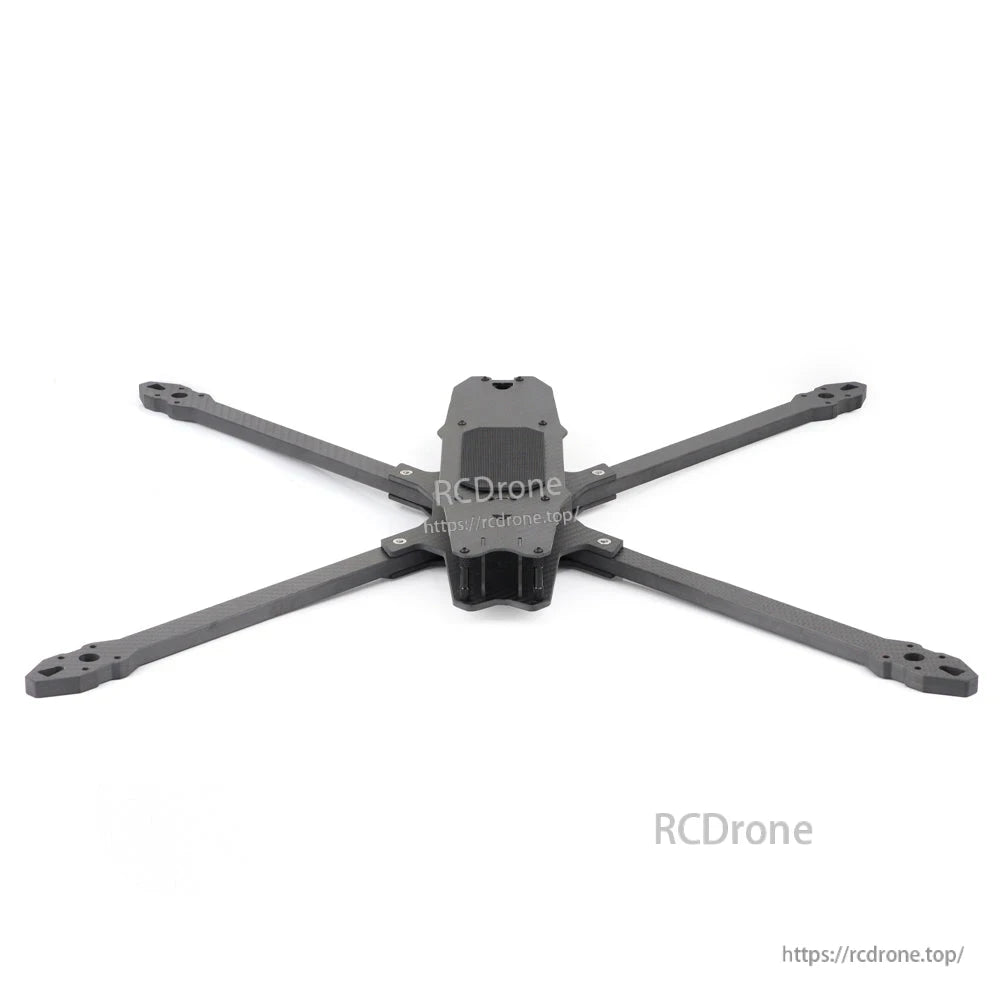 Low front view of carbon fiber FPV drone frame with extended arms and center plate