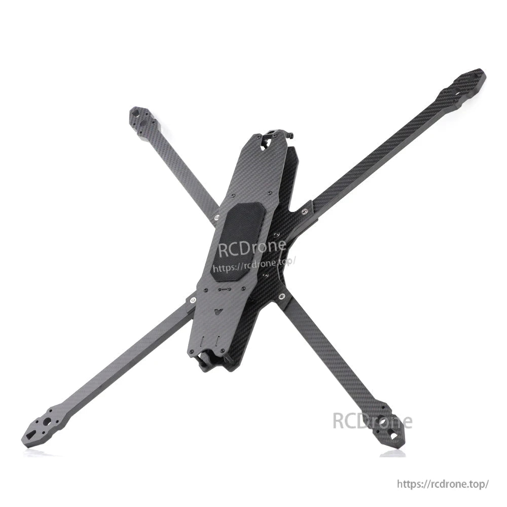 Angled top view of carbon fiber FPV frame showing stacked center plates and arm mounting points