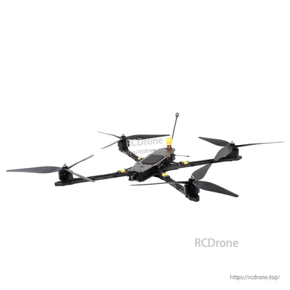 Assembled MY15 long-range FPV drone three-quarter view showing carbon arms and tri-blade props