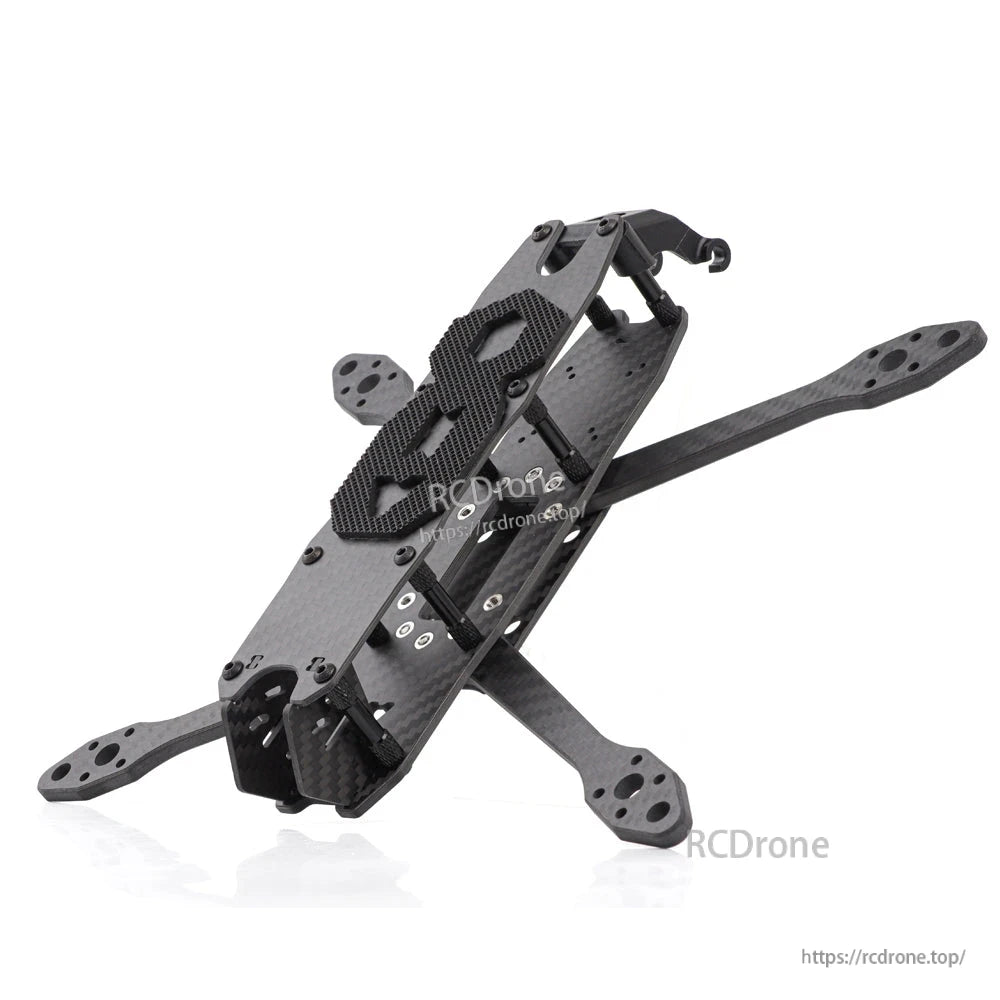 Angled side view of carbon fiber FPV frame highlighting arm geometry and front camera mount