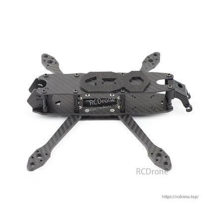 Side profile view of MY5 FPV frame showing camera cage area and stacked carbon plates