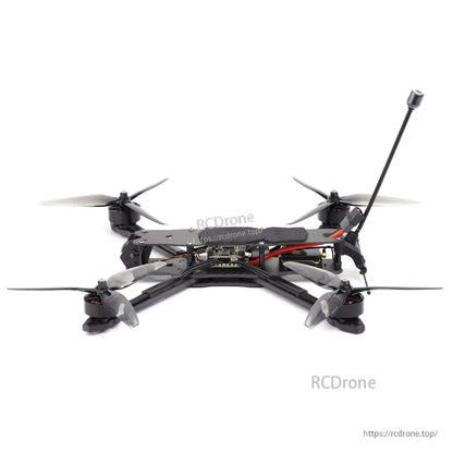 Rear/side view of quad showing underside wiring, arm layout, and rear antenna position