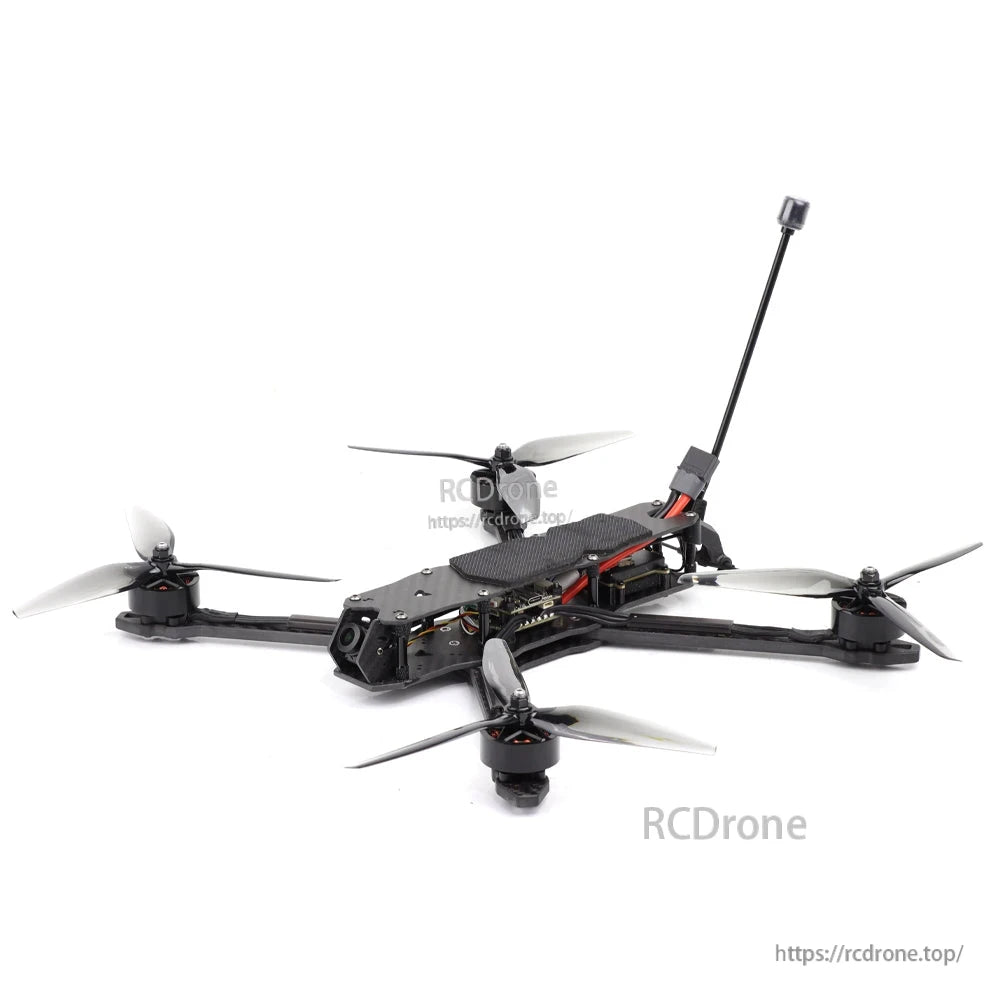 Low side angle of MY7 quad showing top plate, battery strap, and antenna mount