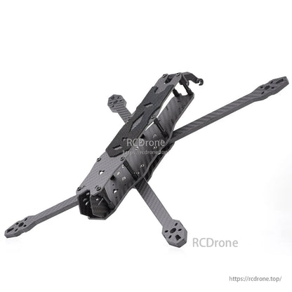 Angled rear-right view of the assembled MY7 frame highlighting top plate cutouts and rear mount