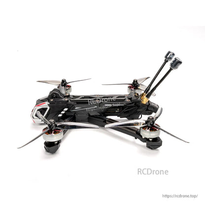 Low side profile view of FPV drone showing top plate, wiring layout, and rear dual antennas