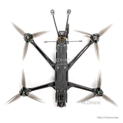 Top-down view of 7-inch FPV quadcopter frame layout with four propellers, electronics bay and rear antennas