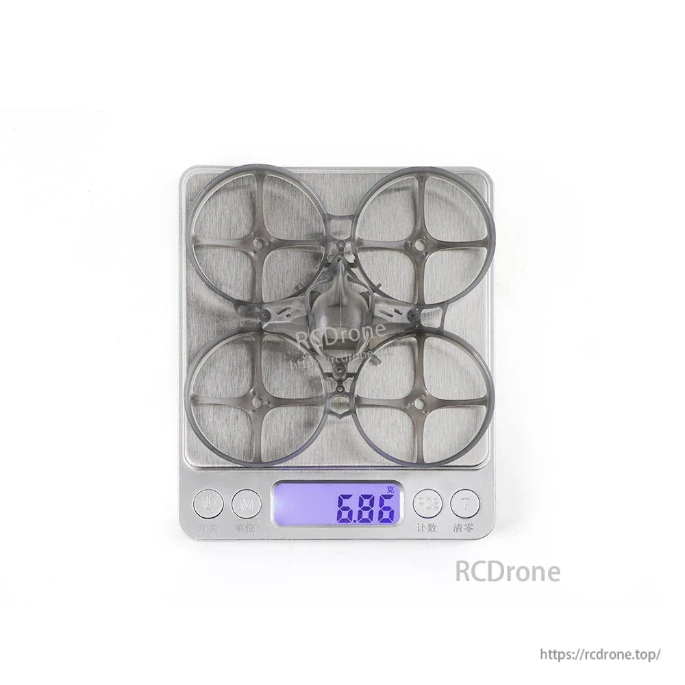 Frame and canopy weight shown on digital scale reading 6.86 g