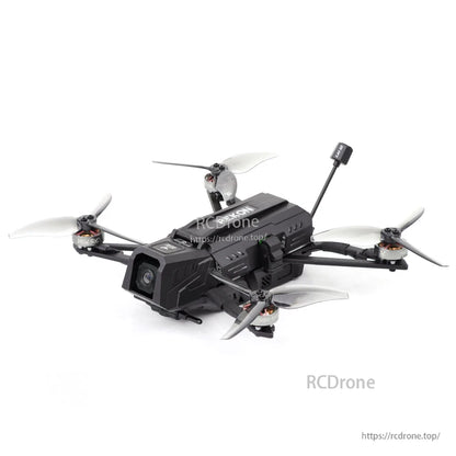 Rekon35 v2 angled side view showing camera lens, carbon arms, motors and upright antenna