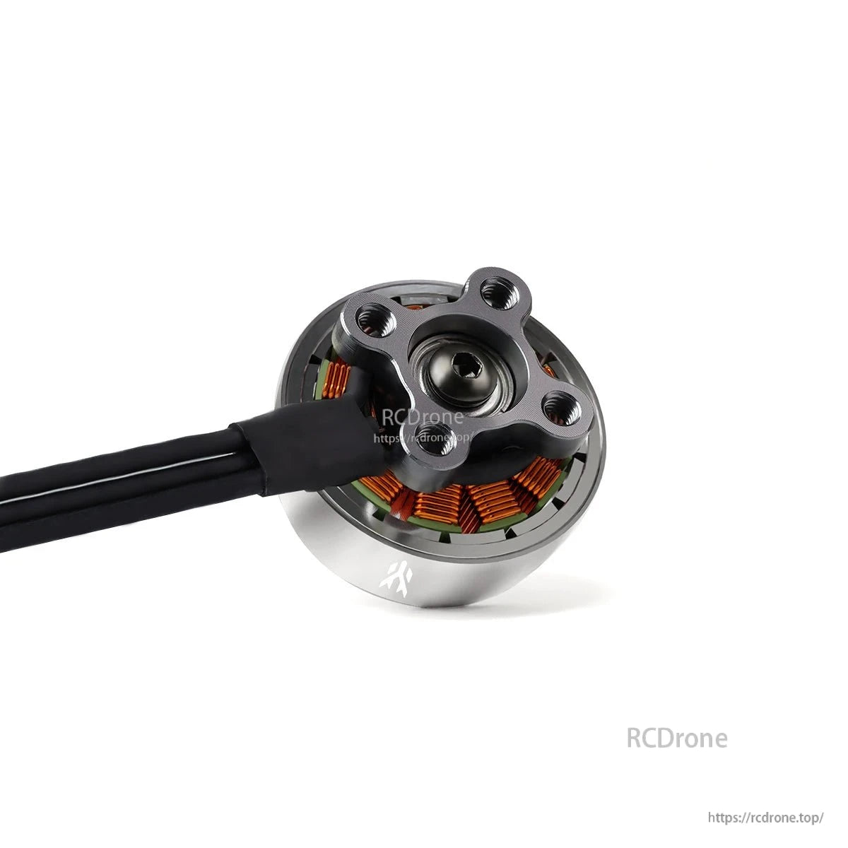Bottom view showing mounting base, bearing area, and attached motor wires