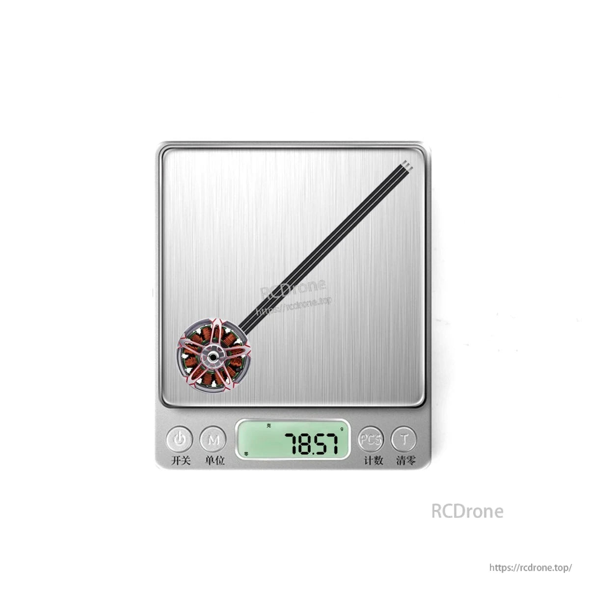 Motor shown on digital scale displaying weight 78.57g
