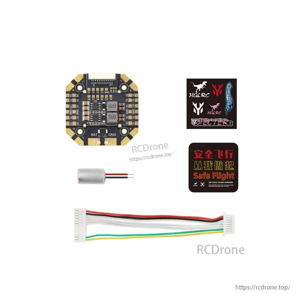Package contents: distribution board, wiring harness, capacitor, stickers and safety card